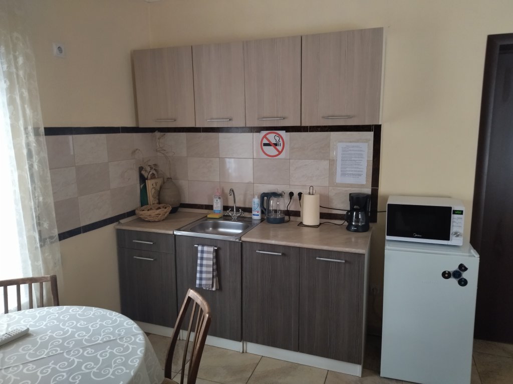 Фотография Коттеджа Дом Одеяло, подушка, мангал