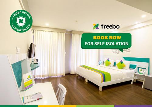 Фотографии гостиницы 
            Treebo Trend Blu Orchid Indiranagar