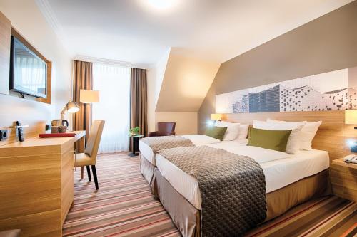 Фотография гостиницы Leonardo Hotel Hamburg Stillhorn