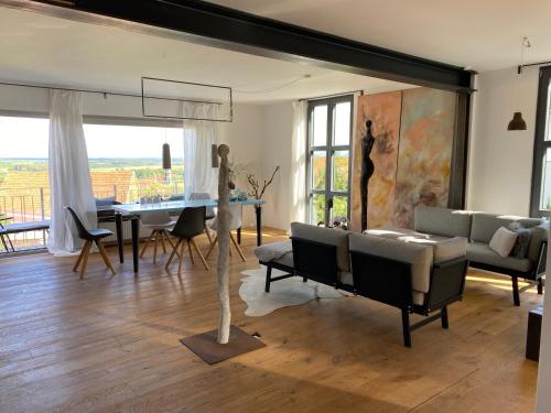 Фотография гостевого дома Atelier de Pfalz-Loftstyl mit Pfalzblick