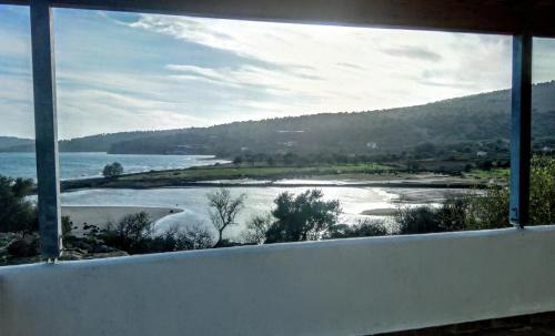 Фотография гостевого дома ''Koukmos beach'' Cottages houses with private sandy beach