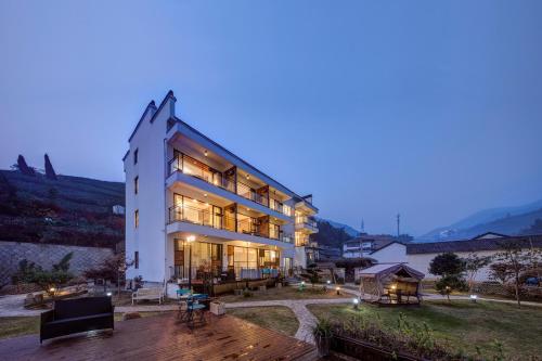 Фотография мини отеля Moganshan Jiang Garden