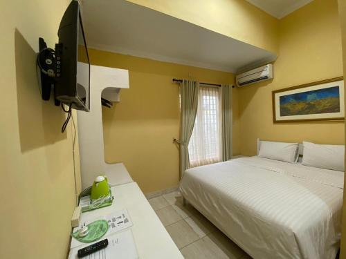 Фотография гостиницы Omah Inap D24 Syariah Nogotirto RedPartner