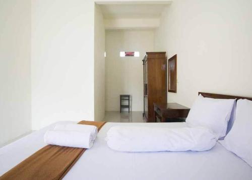 Фотография гостиницы KoolKost Syariah at Ir Soekarno Solo Baru