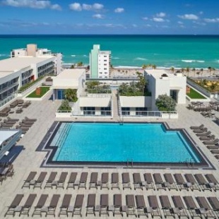 Фотография мини отеля Beachfront Condo - Rooftop POOL