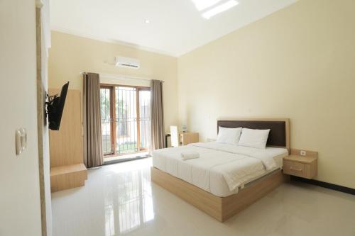 Фотография гостевого дома IDR Green Guest House Syariah RedPartner