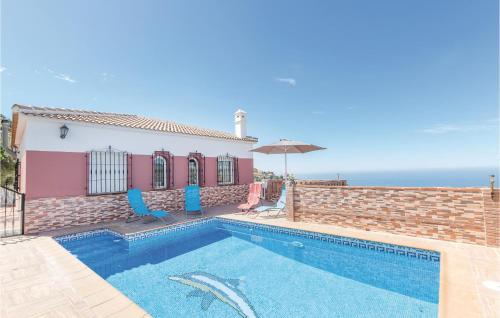 Фотографии гостевого дома 
            Three-Bedroom Holiday Home in Torrox