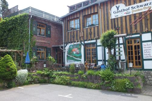 Фотография гостевого дома Gasthof & Pension "Schwarzer Adler"