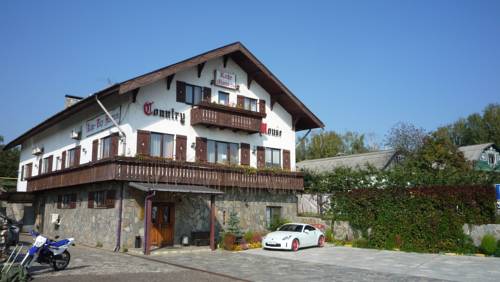 Фотография гостевого дома Кантри Хауз