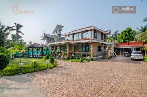 Фотографии мини отеля 
            Bigfoot Stay - Malhar Villa