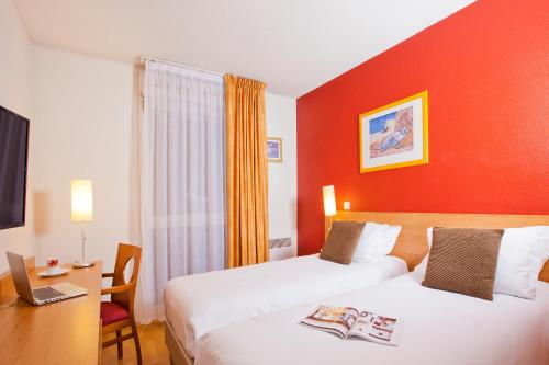 Фотография апарт отеля Séjours & Affaires Rouen Normandie