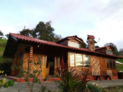Фотографии гостевого дома 
            CASA LA KOCHA, Cabin, Hostal en la Laguna de la Cocha