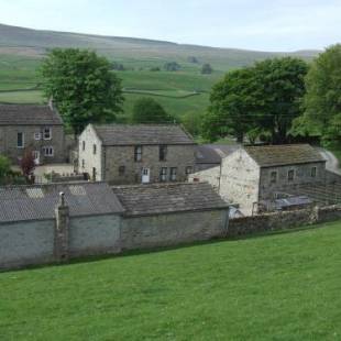 Фотографии гостевого дома 
            Old Camms Holiday Cottages