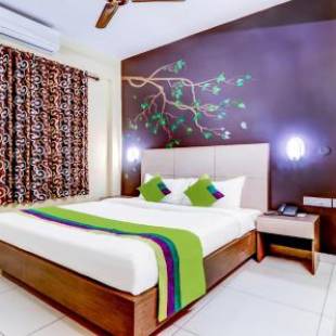 Фотографии гостиницы 
            Treebo Trend Petals Suites Ernakulam Town