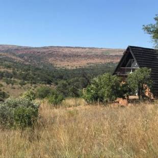 Фотографии гостевого дома 
            Tonquani Bush Chalet