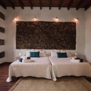 Фотографии гостевого дома 
            Hotelito Rural Flor de Timanfaya