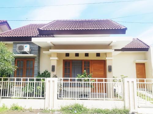 Фотографии гостевого дома 
            East Maguwoharjo Homestay Jogja