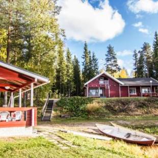 Фотографии гостевого дома 
            Lomaperkkiö Cottages