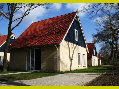 Фотографии гостевого дома 
            Holiday home Vakantiepark Het Timmerholt 1