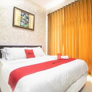 Фотографии гостиницы 
            RedDoorz Syariah @ Hotel 91 Jember