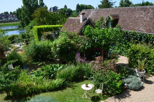 Фотографии гостевого дома 
            Gîte de charme Courjumelle