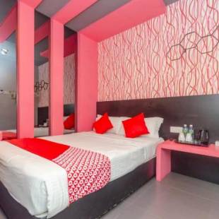 Фотографии гостиницы 
            OYO 902 Rooms Boutique Hotel