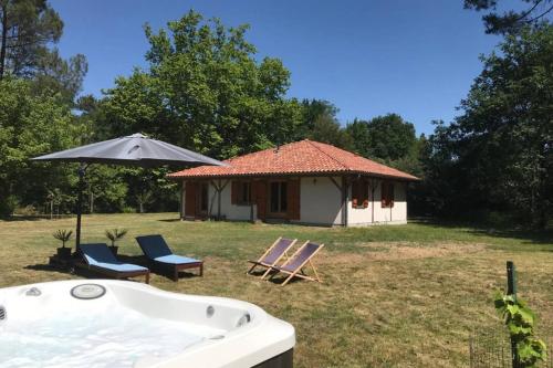 Фотографии гостевого дома 
            Spa et détente au cœur de la forêt des Landes