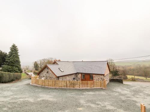 Фотографии гостевого дома 
            Cut Moch, Plas Moelfre Hall Barns