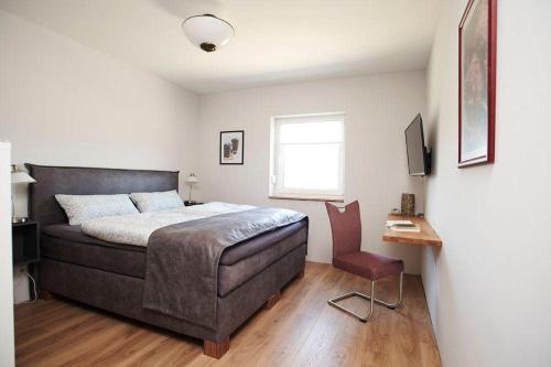 Фотография гостевого дома FRAULINDNERFerien - Doppelzimmer Salzhausen