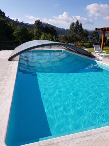 Фотография гостевого дома Quinta da Tormenta -14 pessoas- Cabeceiras de Basto 2 casas e piscina privada