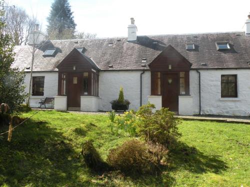 Фотографии гостевого дома 
            Halftown Cottages