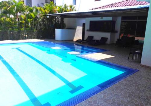 Фотографии гостевого дома 
            Casa Quinta Piscina Privada en el Condominio Campestre el Peñon Girardot