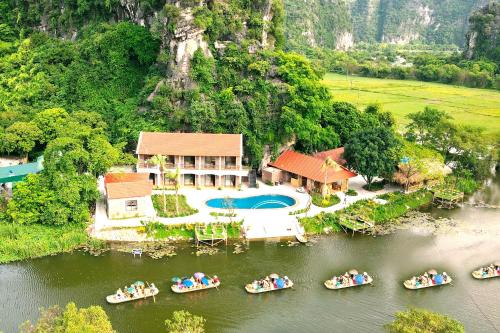 Фотографии гостиницы 
            HoangLong Riverside Homestay