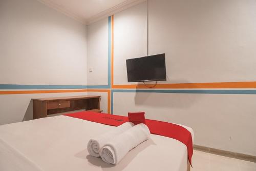 Фотография гостевого дома RedDoorz Plus near Alun Alun Kuningan