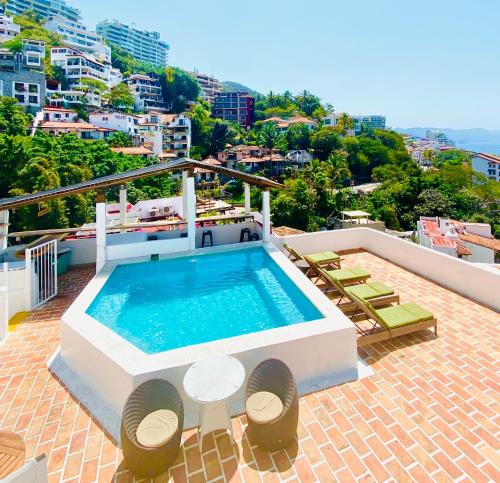 Фотографии гостиницы 
            Hotel Amaca Puerto Vallarta - Adults Only