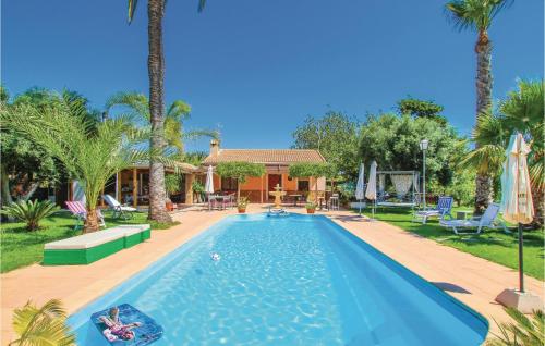 Фотографии гостевого дома 
            Beautiful home in La Marina, Elche w/ WiFi, Outdoor swimming pool and 6 Bedrooms