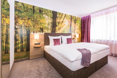 Фотография гостиницы Trihotel - Wellnesshotel am Schweizer Wald
