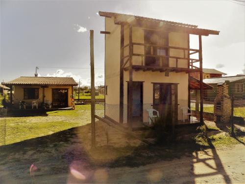 Фотографии гостевого дома 
            ICE POINT SURF HOUSES Praia do Rosa