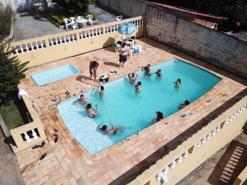 Фотография гостевого дома Linda Chácara com Piscina Churrasqueira e Wi-FI
