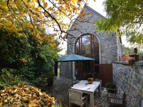 Фотография гостевого дома A charming cottage in the heart of a typical village, outdoor pool in summer