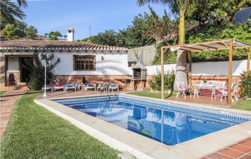 Фотографии гостевого дома 
            Amazing home in Frigiliana w/ WiFi, Outdoor swimming pool and 3 Bedrooms