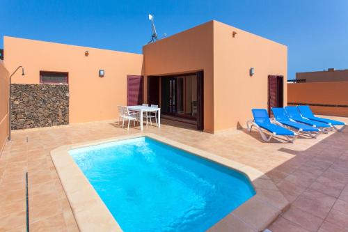 Фотографии гостевого дома 
            Anahi Homes Corralejo - Villa Brezo 1