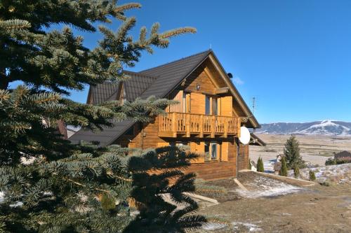 Фотографии гостевого дома 
            Kiwi Chalet