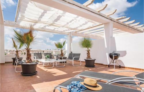 Фотография гостевого дома Studio Holiday Home in San Miguel de Salinas