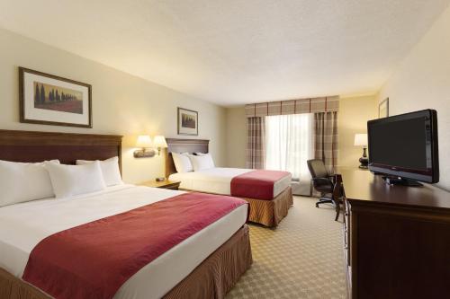 Фотография гостиницы Country Inn & Suites by Radisson, Nevada, MO