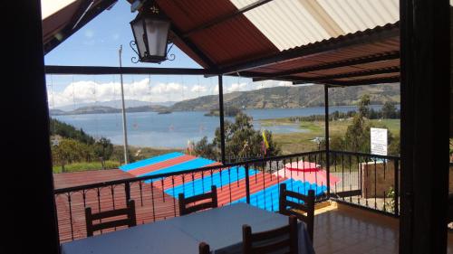 Фотографии гостевого дома 
            Las Heliconias Lago de Tota Desayuno y Almuerzo incluido