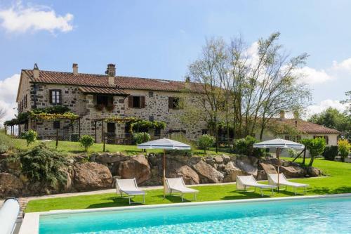 Фотографии гостевого дома 
            Girasole Cottage overlooking the Orcia valley in Tuscany