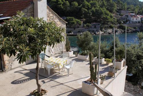 Фотография гостевого дома Seaside secluded apartments Cove Torac, Hvar - 4875