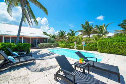 Фотографии гостевого дома 
            Cayman Dream by Grand Cayman Villas