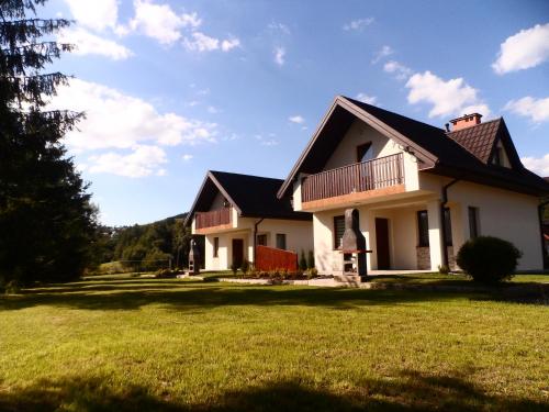 Фотография гостевого дома Bulwary Mszańskie Domki Całoroczne